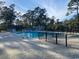 Community pool with surrounding patio at 9 Gumwood Dr., Carolina Shores, NC 28467