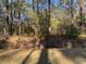 Spacious wooded lot with natural surroundings at 9 Gumwood Dr., Carolina Shores, NC 28467