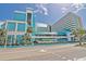 The Landmark Resort featuring vibrant turquoise and white facade against a bright blue sky at 1501 Ocean Blvd. S # 714, Myrtle Beach, SC 29577