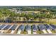 Aerial view of neighborhood homes backing up to a golf course and lake at 546 Beckham Ct., Murrells Inlet, SC 29576