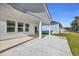 Covered back patio with concrete floor perfect for outdoor relaxation and entertaining at 546 Beckham Ct., Murrells Inlet, SC 29576