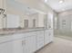 Modern bathroom featuring a double vanity with granite countertop and glass enclosed shower at 546 Beckham Ct., Murrells Inlet, SC 29576