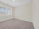 Cozy carpeted bedroom with natural light streaming through the window at 546 Beckham Ct., Murrells Inlet, SC 29576