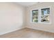 Empty spare bedroom with hardwood floors and large windows at 552 Beckham Ct., Murrells Inlet, SC 29576