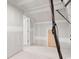 Unfinished room with white walls and wood flooring, offering ample space for customization at 552 Beckham Ct., Murrells Inlet, SC 29576