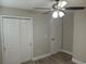 Spacious bedroom with double doors and ceiling fan at 1023 Meares St., Calabash, NC 28467