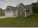 Side view of house showcasing stone accents at 1023 Meares St., Calabash, NC 28467