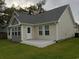 Rear view of house with deck and two-toned siding at 1023 Meares St., Calabash, NC 28467