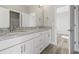 Bathroom with double sink vanity, granite countertops, and modern fixtures at 1316 Marina Bay Dr., North Myrtle Beach, SC 29582