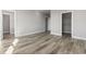 This is a bedroom that leads into a closet and features wood-look flooring at 1316 Marina Bay Dr., North Myrtle Beach, SC 29582