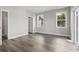 This bedroom features wood-look flooring and windows that provide an abundance of natural light at 1316 Marina Bay Dr., North Myrtle Beach, SC 29582