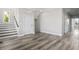 Spacious foyer with hardwood floors, neutral walls, and staircase leading to the upper level at 1316 Marina Bay Dr., North Myrtle Beach, SC 29582