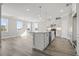 Open-concept kitchen with a large island, granite countertops, and stainless steel appliances at 1316 Marina Bay Dr., North Myrtle Beach, SC 29582