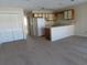 Spacious living room with neutral carpeting at 510 Fairwood Lakes Dr. # 16M, Myrtle Beach, SC 29588