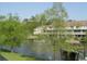 Tranquil pond view with lush green trees and gazebo at 510 Fairwood Lakes Dr. # 16M, Myrtle Beach, SC 29588