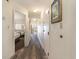 Bright hallway with light wood floors and access to bedrooms at 4800 S Ocean Blvd. # 824, North Myrtle Beach, SC 29582