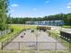 Community dog park with agility equipment at 718 Nw Palm Frond Way # 66, Calabash, NC 28467