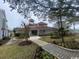 Beautiful community clubhouse with manicured landscaping and inviting entrance, a great space to gather at 4396 Baldwin Ave. # 47, Little River, SC 29566