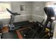 Home exercise room featuring a treadmill and other fitness equipment for staying active at 4396 Baldwin Ave. # 47, Little River, SC 29566