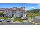 Charming townhomes featuring covered entrances, well-maintained landscaping, and convenient parking at 4396 Baldwin Ave. # 47, Little River, SC 29566