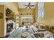 Spacious living room with fireplace, high ceilings, and sliding doors to outdoor space offers an abundance of natural light at 4396 Baldwin Ave. # 47, Little River, SC 29566