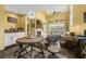 Bright living room features a fireplace, high ceilings, access to outdoor deck, and modern furnishings at 4396 Baldwin Ave. # 47, Little River, SC 29566