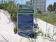 Sign displays local beach rules and regulations for visitors at 6305 N Ocean Blvd. # B-3, North Myrtle Beach, SC 29582