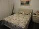 Cozy bedroom with a seashell-themed bedspread and built-in closet at 6305 N Ocean Blvd. # B-3, North Myrtle Beach, SC 29582