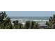 Stunning ocean view with gentle waves and lush greenery at 6305 N Ocean Blvd. # B-3, North Myrtle Beach, SC 29582