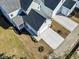 An aerial view showcasing the house, double garage, and landscaping at 1604 James Island Ave., North Myrtle Beach, SC 29582