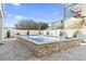 Backyard swimming pool and paver patio with a white fence, palm tree, and small shrubs at 2401 Duffy St., North Myrtle Beach, SC 29582