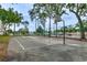 Outdoor basketball court surrounded by trees in a community recreational area at 5905 S Kings Hwy. # A 115, Myrtle Beach, SC 29575