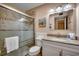 Well-appointed bathroom with a tiled shower, granite countertop, and a neutral color scheme at 5905 S Kings Hwy. # A 115, Myrtle Beach, SC 29575