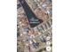 Aerial view of land parcel in Tuscan Sands at Grande Dunes with surrounding homes and lake at 2115 Mirabel Ct., North Myrtle Beach, SC 29582