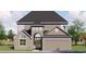 Attractive two-story home featuring stone accents, arched entry, and an attached two-car garage at 5508 Via Verde Dr., North Myrtle Beach, SC 29582