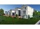 Row of townhouses with private backyards and patios at 202-D Madison Ct., Myrtle Beach, SC 29577