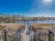 Picturesque dock with chairs, offering a serene spot to relax by the water at 606 Waterway Village Blvd. # 28-C, Myrtle Beach, SC 29579