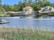 Waterfront home featuring a private dock and boat lift, perfect for water enthusiasts at 606 Waterway Village Blvd. # 28-C, Myrtle Beach, SC 29579