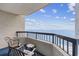 Balcony with seating offers beautiful ocean and beach views at 2401 S Ocean Blvd. # 1156, Myrtle Beach, SC 29577