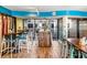 Bar seating area with wood accents, bar stools, and decorative lighting at 2401 S Ocean Blvd. # 1156, Myrtle Beach, SC 29577