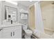 Well-lit bathroom features a tub and a clean aesthetic design with a view into the kitchen at 2401 S Ocean Blvd. # 1156, Myrtle Beach, SC 29577