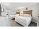 Bright and airy bedroom featuring two queen-sized beds, modern decor, and a glimpse of the balcony, creating a relaxing ambiance at 2401 S Ocean Blvd. # 1156, Myrtle Beach, SC 29577