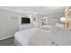 Comfortable bedroom featuring two beds, a dresser, and a view into the hall and kitchen at 2401 S Ocean Blvd. # 1156, Myrtle Beach, SC 29577