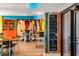 Restaurant interior with surfboards, dining tables, chairs, and chalkboard menu at 2401 S Ocean Blvd. # 1156, Myrtle Beach, SC 29577