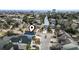 Aerial view of a blue coastal home situated on a canal in a vibrant neighborhood at 2307 Tortuga Ln., North Myrtle Beach, SC 29582