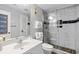 Modern bathroom features a glass enclosed shower with marble tile and stylish fixtures at 5905 S Kings Highway # 1117, Myrtle Beach, SC 29575
