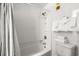 Clean bathroom featuring a tub and shower combination with tile walls and provided linens at 5905 S Kings Highway # 1117, Myrtle Beach, SC 29575