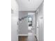 Inviting hallway with a welcome sign leading to a sunlit balcony overlooking the beach at 5905 S Kings Highway # 1117, Myrtle Beach, SC 29575