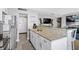 Kitchen with breakfast bar offering seamless access to the living area, featuring modern appliances at 5905 S Kings Highway # 1117, Myrtle Beach, SC 29575