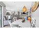 Open floor plan shows kitchen, dining area and living room filled with natural light at 5905 S Kings Highway # 1117, Myrtle Beach, SC 29575
